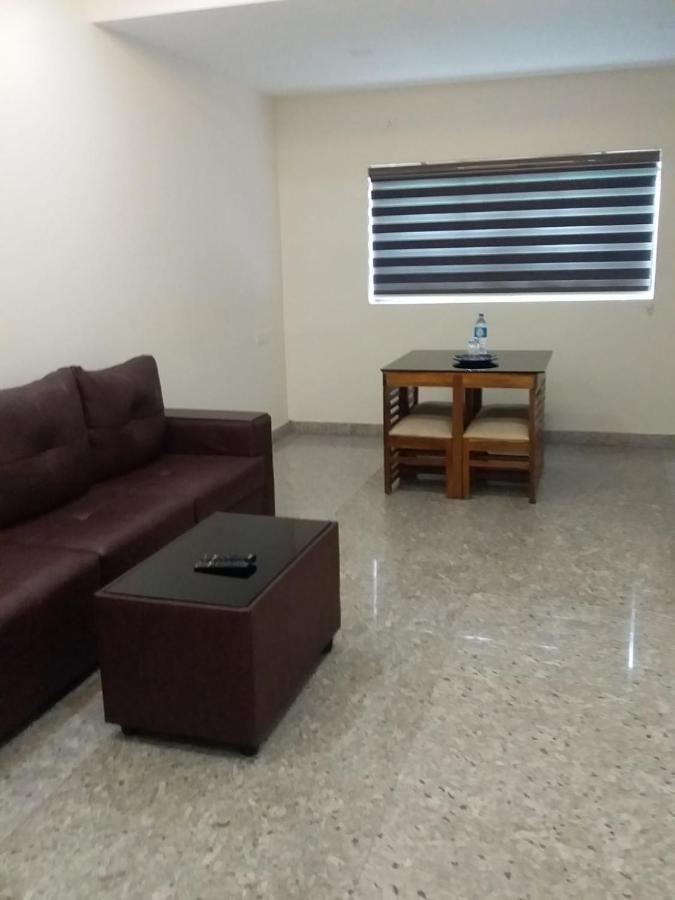Redbell Suites Residency Kondotty Ngoại thất bức ảnh
